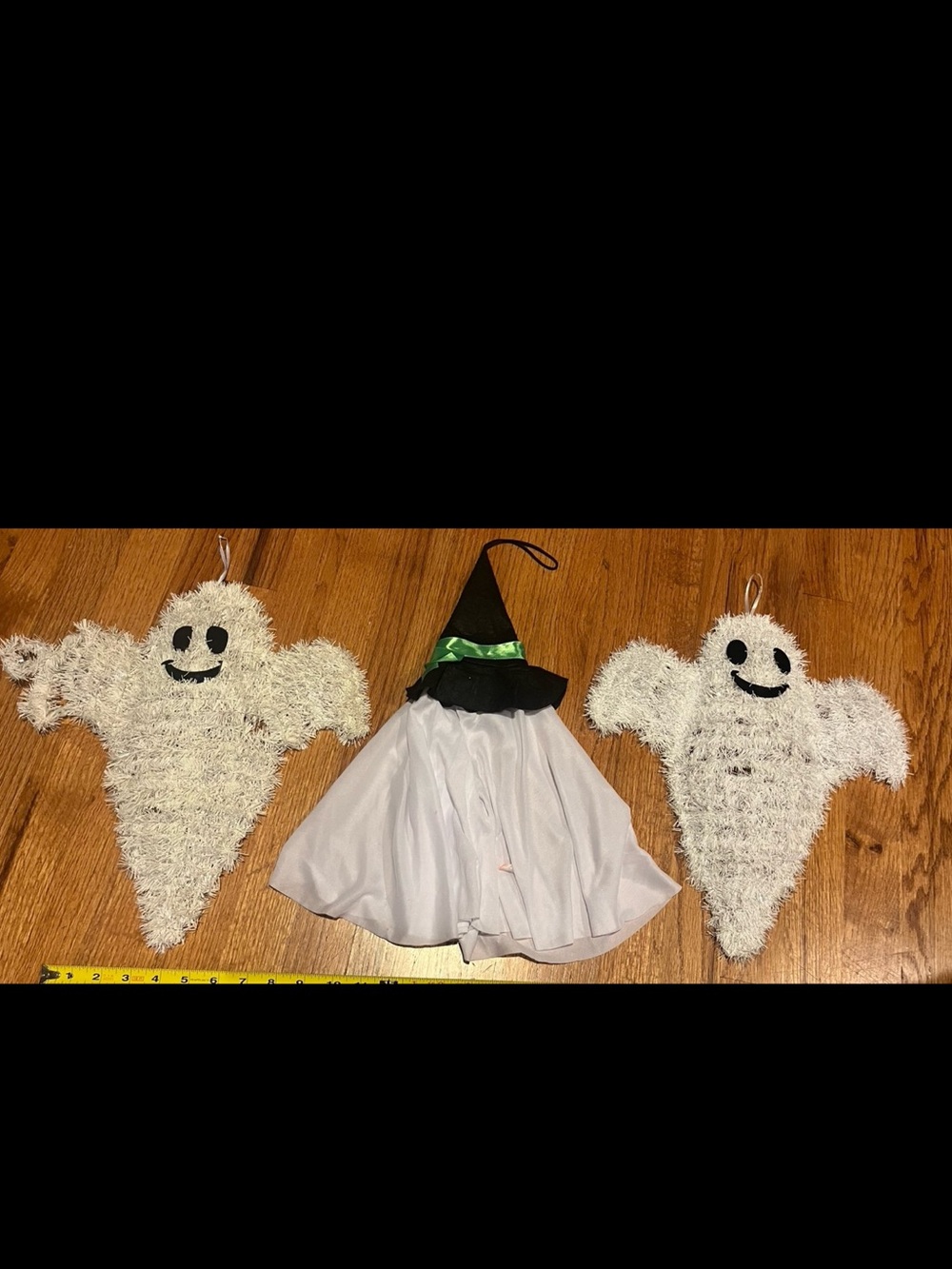Halloween ghosts. one with hat.